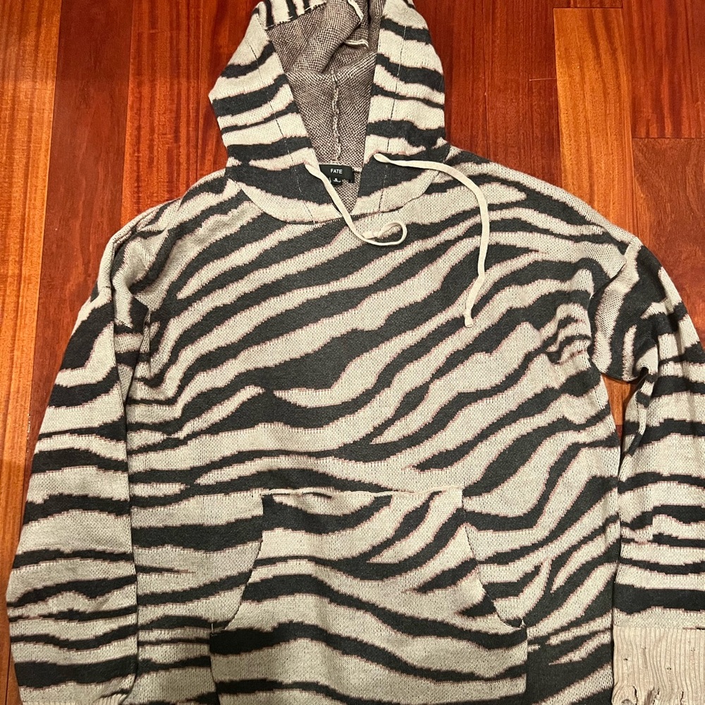 Woman’s zebra printed sweatshirt